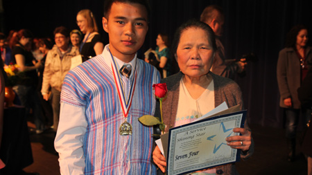 Seven Four and his mother at award ceremony